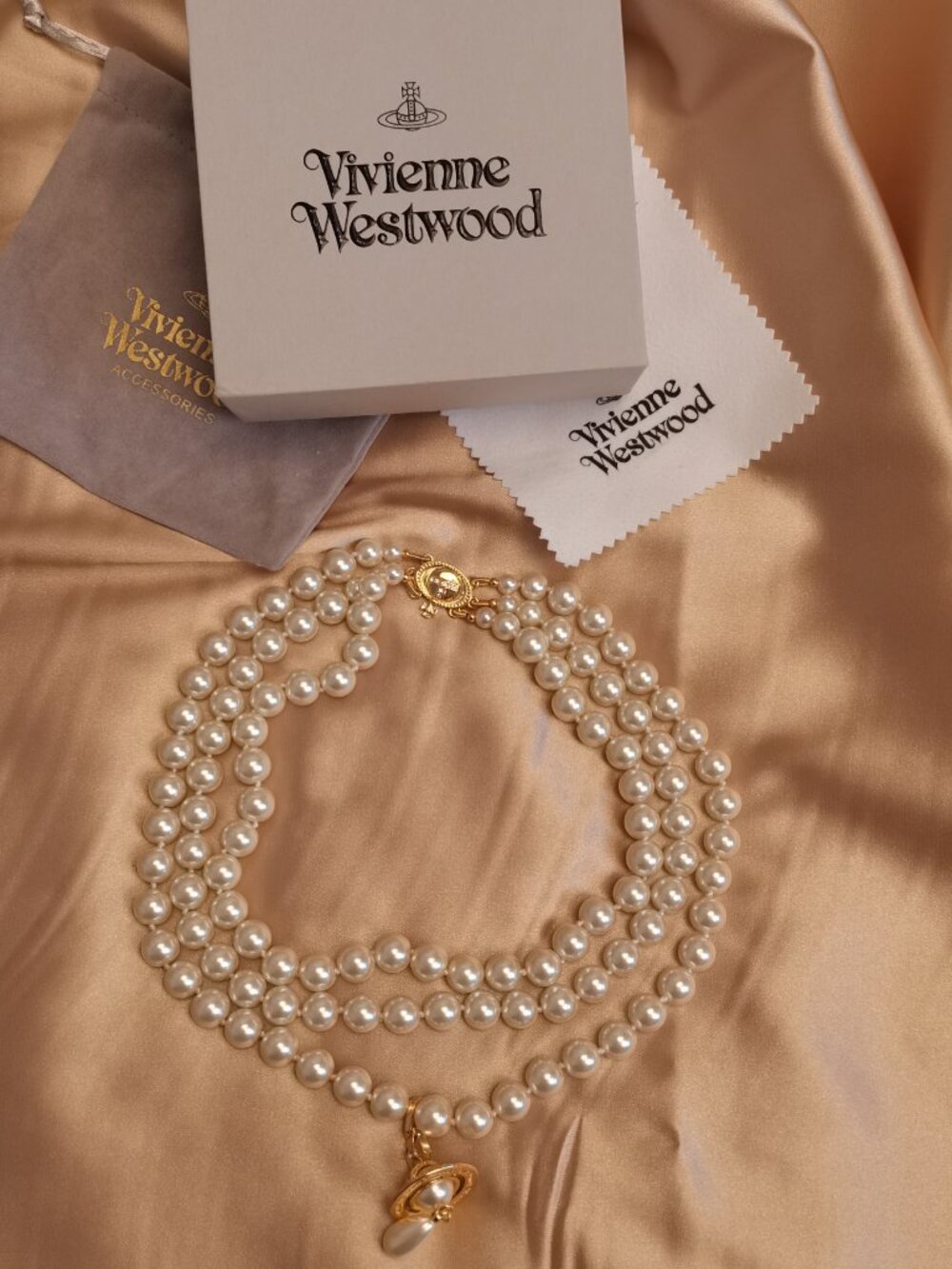 Brand new Vivienne Westwood Three Row Pearl Bas Relief Choker in Gold